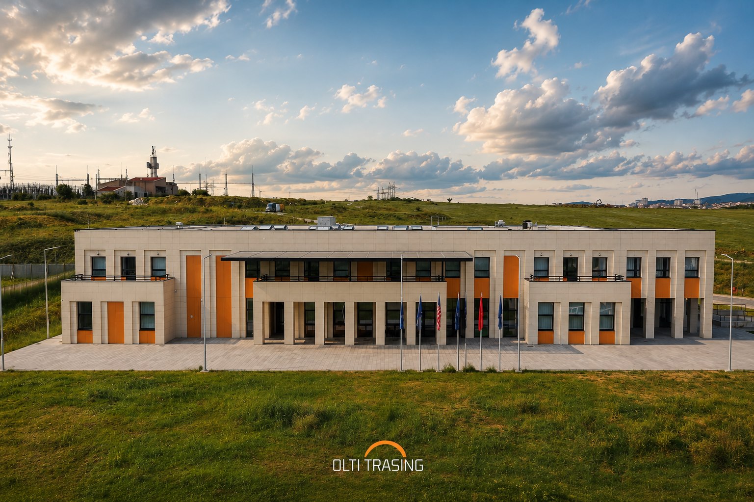 The completed Olti Trasing headquarters building, colonnaded frontage and flag court