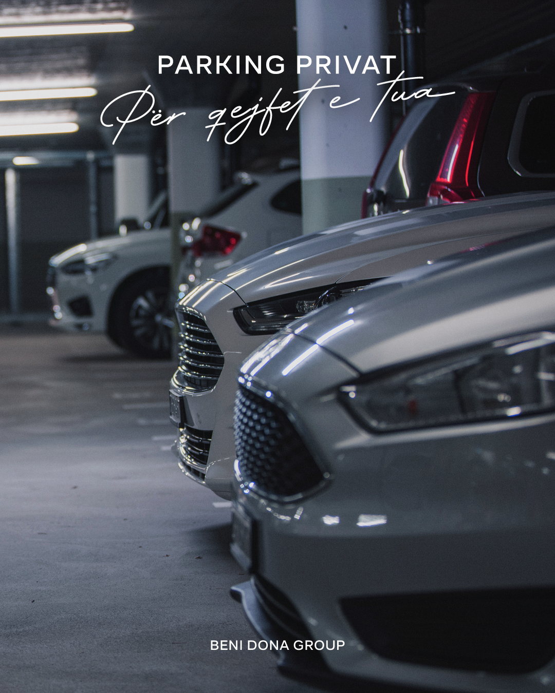 A row of resident cars in Donika 2's private underground parking